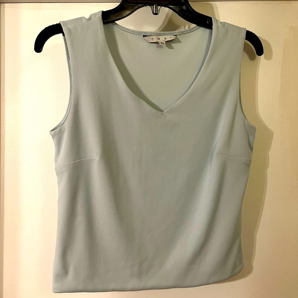 CAbi size medium blue crop blouse with busy darts
